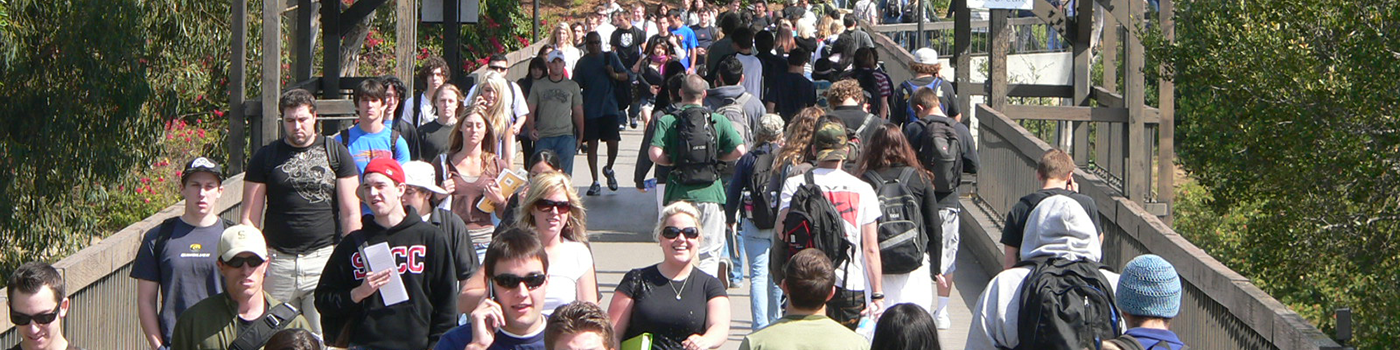 Students on the bridge between the two campuses.